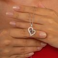 Eternal Affection Stainless Steel Heart Pendant Necklace with 100 Languages I Love You Display. 