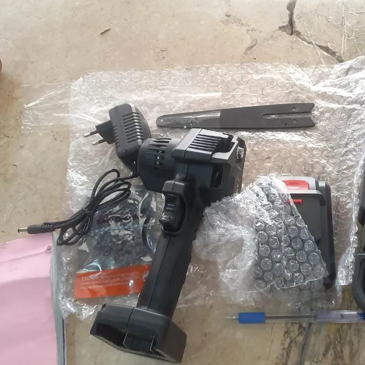 220V%20Mini%20Cordless%20Electric%20Chainsaw%20Handheld%20Rechargeable%20Electric%20Saw%20With%20Battery%20UK%20Charger%20Set%20for%20Wood%20Branch%20Cutter%20-%20Image%202