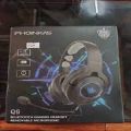 PHOINIKAS Q9 Professional Wireless Bluetooth Gaming Headset, Gaming Headphone, for PS4/PS5/PC/Xbox One/ Nintendo Switch, 7.1 Stereo, with Mobile Phone Bluetooth Function, Detachable Noise Cancelling Microphone, 40H Playtime, Blue LED Light. 