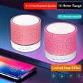 Mini Portable Bluetooth & Rechargeable Speaker with Light + SD Card + USB Supported Multi Color. 