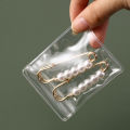 50/84/160Pcs Transparent Jewelry Storage Book With Buckle / High Quality Crystal Jewelry Anti-Rust Ziplock Sealed Bag / Dustproof Anti-oxidation Clear Jewelry Storage Box. 