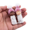 Mini Reborn Baby Dolls Tiny Baby Figurines Small King Cake Babies Little Resin Babies for Baby Shower Favors Decoration. 