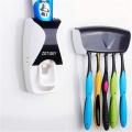 Automatic Toothpaste Dispenser And Tooth Brush Holder Set - Wall mounted. 