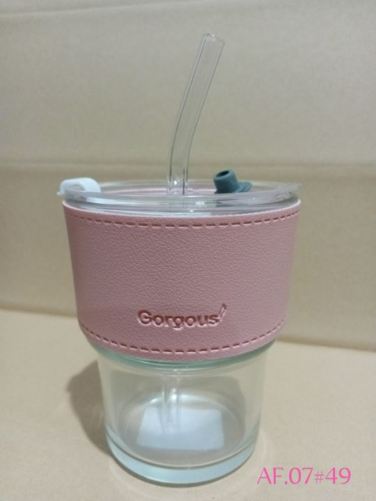 Tumbler%20Mug%20with%20Lid,%20Glass%20Straw%20and%20Protective%20Anti-Skid%20Leather%20Sleeve%20for%20Hot%20and%20Cold%20Beverages%20Tea%20Coffee%20Smoothies%20Fruit%20Juice%20Travel%20Mug%20.435ml%20-%20Image%2010