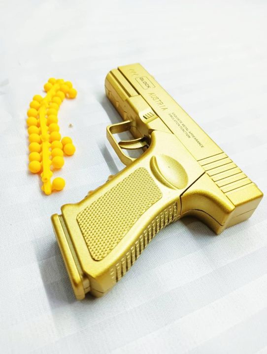 Kids%20Spring-Action%20Toy%20Blaster%20%E2%80%93%20Gold%20Metallic%20Novelty%20Blaster%20with%20Mechanical%20Shell-Eject%20Effect,%20Soft%20Foam%20Dart%20Catapult%20Toy,%20Safe%20Soft%20Projectiles%20for%20Indoor%20&%20Outdoor%20Play,%20Fun%20Gift%20for%20Ages%208+%20-%20Image%203