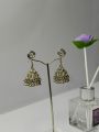 Desi style fine quality silver jhumka; trendy jewelery for party or festive wear. 