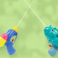 Dinosaur Water Gun Push Type Mini Beach Toy Cartoon Water Gun Water Gun Toy Anti-collision Portable Push Water Gun Bath Toys. 