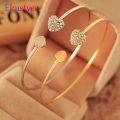 2 pieces Golden silver Double hearts fashion Adjustable bracelets. 