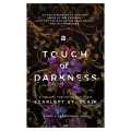 A Touch of Darkness by Scarlett St. Clair. 