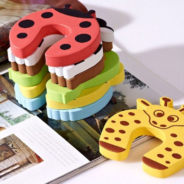 Door%20Stopper%20Silicone%20-%20Baby%20Safety%20Gadgets,%20Baby%20Corner%20Guards%20Edge%20Protection%20Cartoon%20Animal%20Kids%20Safety%20Gadget%20Security%20Cards%20Lock%20Door%20Stopper%20-%204%20Pieces%20Pack%20And%206%20Pieces.%20Baby%20Safety%20Device%20That%20Keeps%20The%20Doors%20In%20Your%20Home%20Securely%20Closed%20-%20Image%203