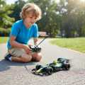 Drift Spray F1 Formula Remote Control Racing Car Rechargeable Multicolor. 