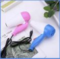 Professional foldable hair dryer machine for girls/men/women comes with 2 speeds fashion hair style machine portable 1000 watt hair dryer machine easy to carry machine low power consumption hair dryer. 