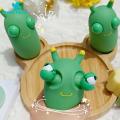 Green Home Eye-Popping Toy TPR Eye-Popping Vegetable Worm Doll Decompression Toy. 