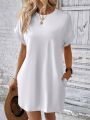 LOOSE FIT SOLID COLOR ROUND NECK BATWING SLEEVE DRESS. 