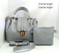 Ladies Soft PU Leather Handbag with Small Carry Pouch and Adjustable Shoulder Strap. 