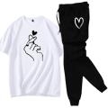 Red Stylish Printed Tracksuit for Women and Girls - Soft Cotton T-shirt and Trouser Set. 