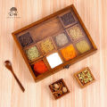 Spice Container ( Masala Box ) Made of Pure Rose Wood with Hand Carving Having 12 removable boxes with capacity of over 100 Gram (Powder Spices) with Glass Lid and one Spoon. 