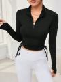 LONG SLEEVE SPORTS T-SHIRT WITH ZIPPER & DRAWSTRING FRONT. 