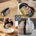 Manual Garlic Press Rocker with Handle Stainless Steel Garlic Crusher Squeezer Slicer Gadgets Tool For Garlic Paste. 