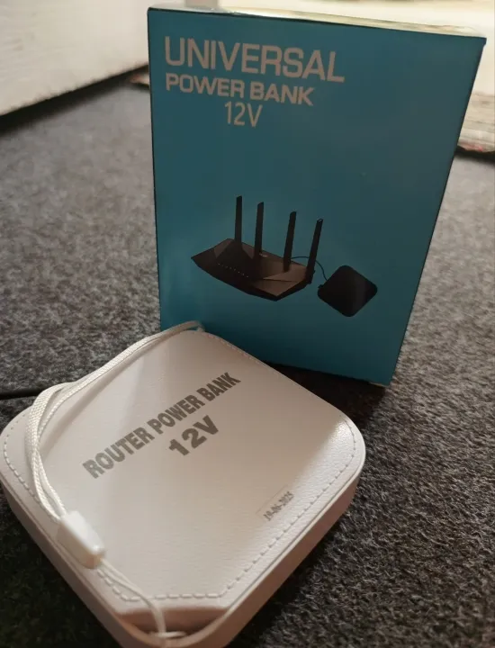 12V%20Mini%20UPS%20Power%20Bank%20for%20WiFi%20Router%20&%20Fiber%20ONT%20%E2%80%93%204%E2%80%935%20Hours%20Backup%20%7C%20Plug%20&%20Play%20%7C%20PTCL,%20Nayatel%20&%20StormFiber%20Compatible%20-%20Image%202
