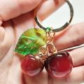 Vibrant Fruit Charms Keychain Colorful Red Fruit Key Chain Metal Resin Cherry Keychain for Purse Backpack. 