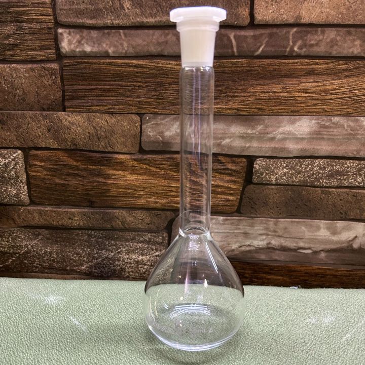 Volumetric%20Flask,%20250ml%20%E2%80%93%20Clear-Fitted%20with%20Polypropylene%20Stopper%20-%20Class%20A,%20Tolerance%20%C2%B10.10%20ml%20-%20White%20Graduation%20Mark%20-%20Borosilicate%20Glass%20%E2%80%93NORMAX%20-%20Image%208