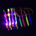 SF Outdoor Shining Rocket Flash LED Light Slingshot Elastic Helicopter Rotating Outdoor Flying Toy Arrow Party Gift Childrens Favor #444684. 