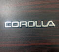 Pack of 2 COROLLA XE-Saloon Monogram Plastic Emblem For Toyota Corolla 89-94. 