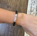 Customize your Name on bracelet with black color beads. 