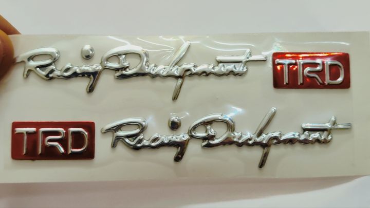 (2pcs)%20TRD,%20Red%20and%20Silver%20Silicon,%20Monogram,%20Sticker%20for%20Bikes,%20Cars,%20etc%20High%20Quality%20Silicon%20Stickers%20Silicon%20Coated%20-%20Image%202