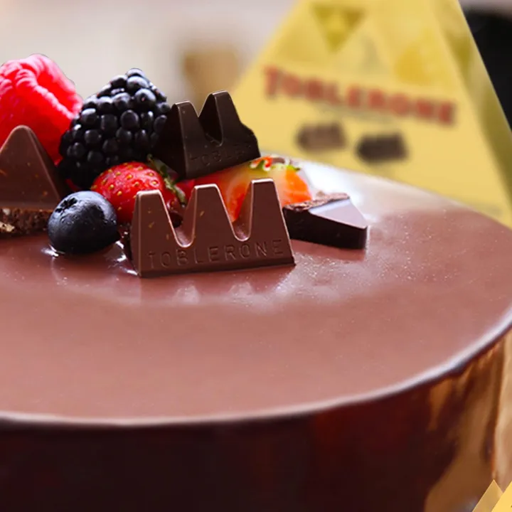 Toblerone%20Dark%20Chocolate%20with%20honey%20and%20almond%20Minis%20Laydown%20Bag%20200g%20-%20Image%203