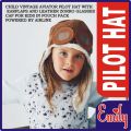 CHILD VINTAGE AVIATOR BABY PILOT HAT WITH EARFLAPS AND LEATHER ZORRO GLASSESS CAP FOR KIDS IN POUCH PACK POWERED BY AIRLINE. 