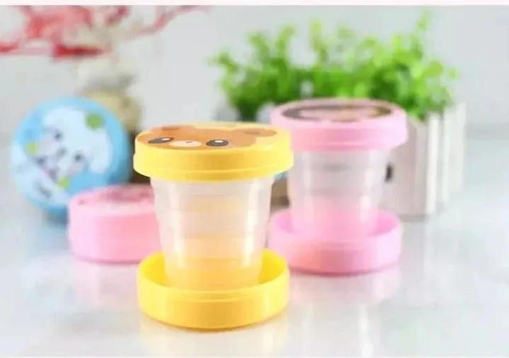 Magic%20Folding%20Cup%20for%20Kids%20with%20Lid%20%7C%20Cute%20Cartoon%20Design%20Portable%20Water%20Drinking%20Cup%20%7C%20Easy%20to%20Carry%20Travel%20Cup%20for%20School,%20Picnic%20&%20Outdoor%20Use%20-%20Image%207