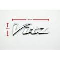 Vitz back logo/monogram. 
