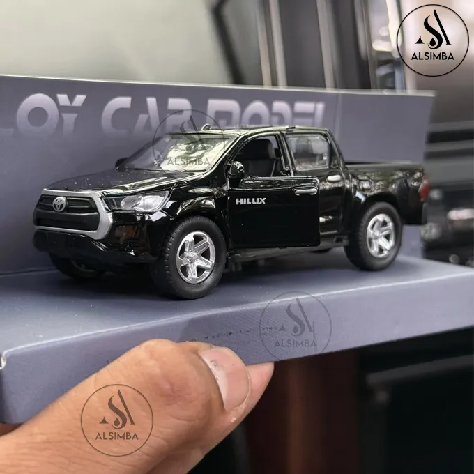 Toyota%20Hilux%20Vigo%20Die%20Cast%20Model%20Metal%20Toy%20Car%20%E2%80%93%20Lights%20&%20Music%20Sound%20Feature%20%E2%80%93%201:36%20Scale%20%E2%80%93%20Front%20Doors%20Openable%20%E2%80%93%20Size%20Approx.%205-Inches%20%E2%80%93%20White%20-%20Image%205