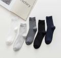 Socks wholesale spring summer men's cotton socks casual mid socks black and white business solid color thin men's socks manufacturers wholesale. 