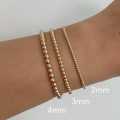 3-Yellow Gold Beaded Bracelets. 