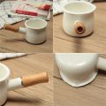 Enamel Milk Pan, Mini Butter Warmer 10cm Enamelware Saucepan Pan Cookware with Wooden Handle, Perfect Size for Heating Smaller Liquid Portions. (White). 