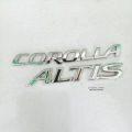 Cars logo - Toyota Corolla GLI Chrome Logo with Monogram 2009-14 Front Logo and Back Logo with Monogram Complete Set - Complete Sets - Single pieces also available - Set of 6 Emblems for Toyota Corolla (Chrome Colour) - Complete Emblem Upgrade - Grande. 