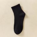 Socks mid-cut sports black and white summer men and women raw socks thin couple ins minimalist style basketball stockings. 