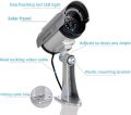 Solar Powered dummy Security Camera, Bullet Dummy Surveillance  System with Realistic Red Flashing Lights and Warning Sticker Indoor Outdoor (1, Silver). 