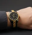 Classic Men’s Watch – Gold Plated Bezel with Steel Bracelet. 