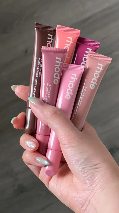 Rhode%20Lip%20Gloss%20%E2%80%93%20Long-Lasting,%20Moisturizing,%20Non-Stick,%20No-Budge%20Lip%20Stain%20with%20Velvet,%20Mirror%20Finish%20%E2%80%93%20Plumping,%20Smooth,%20and%20Delicate%20for%20a%20Glass-Like%20Shine%20Rhode%20Dupe,Hydrating%20lipgloss%20,%20Rhode%20Lipgloss%20Original%20Rhode%20lip%20peptide%20finest%20dupe%20-%20Image%202