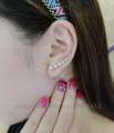 A Row Of 7 Crystal Stud Earrings For Girls - Pair. 