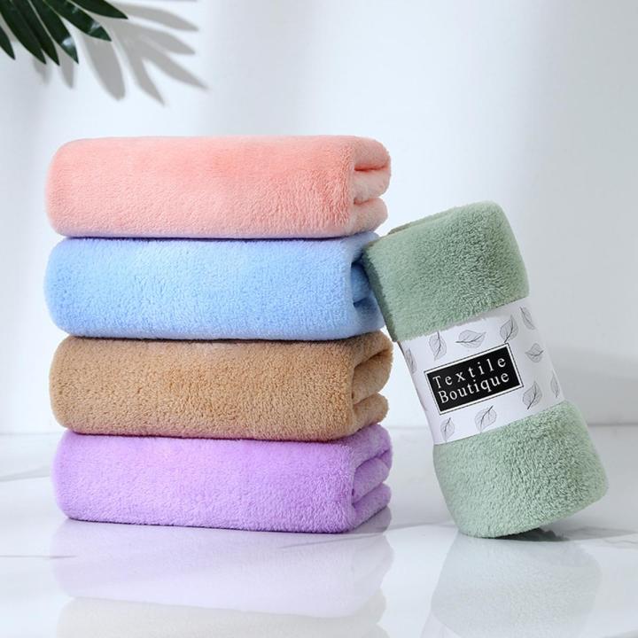Manufacturers wholesale coral fleece towel warp knitted soft absorbent face towel does not shed hair does not fade gift towel logo