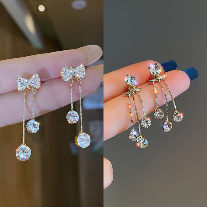 Korean fashion diamond studded bow earrings women's autumn and winter niche personality versatile long tassel stud earrings earrings trendy
