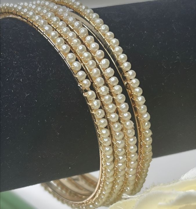 ladies%20bangles%20-Trendy%20pearl%20Bangles%20with%20White%20Pearls/Beads%20churiya%2012%20pcs%20for%20Girls%20and%20Women"%20churiyan%20set%20-%20sizes%202%20or%202.5%20dhai%20-%20Image%202