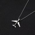 Classic niche design trendy men's and women's airplane necklace simple hip-hop nightclub dance cute airplane pendant gift. 