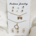 Pack Of 8 Jewelry Set 3 Rings With Adjustable Sizes - 2 Necklace / Pendant & 3 Stud Earrings (Random Design. 