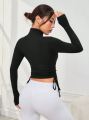 LONG SLEEVE SPORTS T-SHIRT WITH ZIPPER & DRAWSTRING FRONT. 